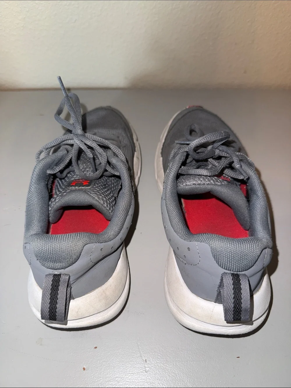Under Armour Kids Gray Sneakers with Red Logo